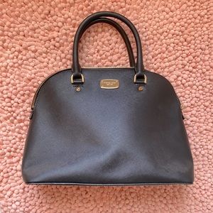 Black Michael Kors bag. Only used 3 times, still in great condition!
